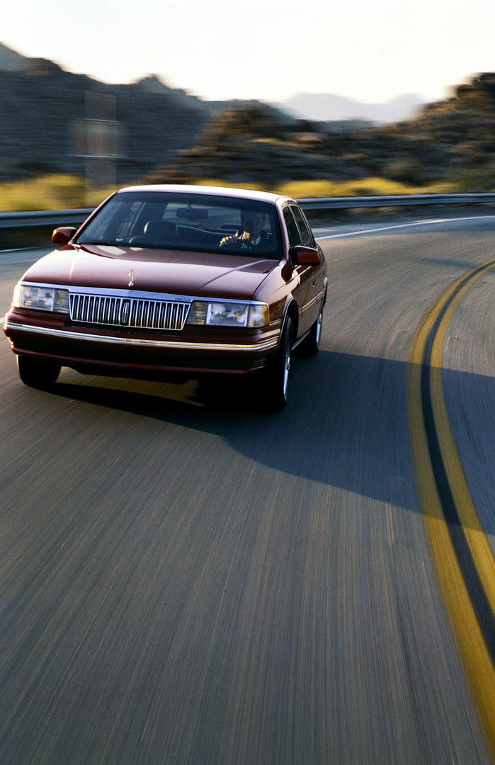 This archival image documents the 1992 Lincoln Continental four-door and is preserved in the Ford Heritage Vault as part of Ford Motor Company's historic photographic archive. Free for personal, non-commercial use. Ford Heritage Vault reference AR...