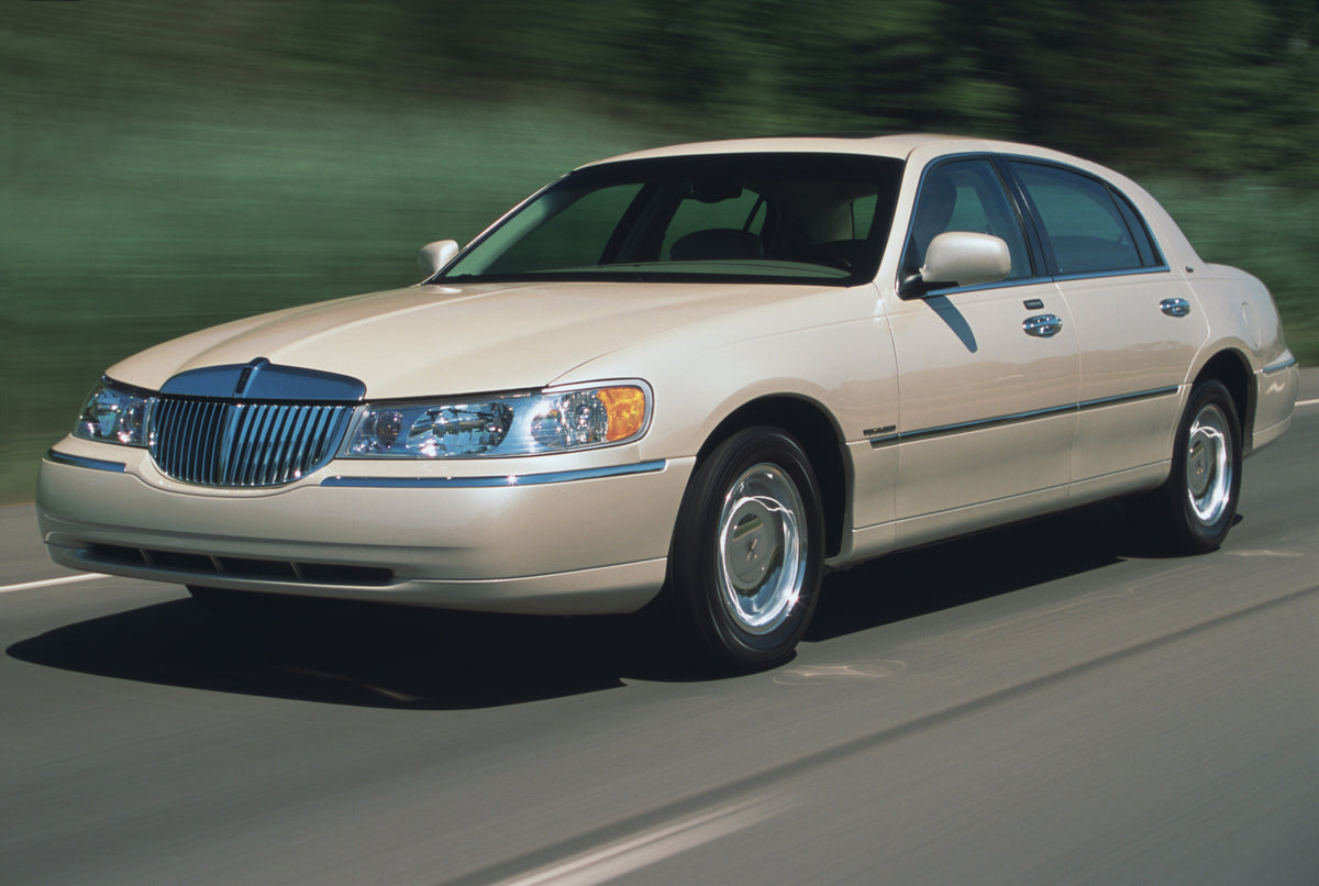 This archival image documents the 2002 Lincoln Town Car and is preserved in the Ford Heritage Vault as part of Ford Motor Company's historic photographic archive. Free for personal, non-commercial use. Ford Heritage Vault reference AR-2008-8.1.1.2...