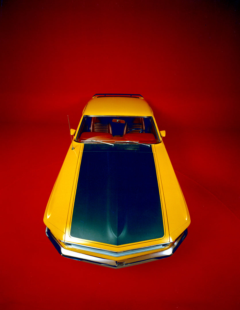 This archival image documents the 1969 Ford Mustang Boss 302 aerial view in studio and is preserved in the Ford Heritage Vault as part of Ford Motor Company's historic photographic archive. Free for personal, non-commercial use. Ford Heritage Vaul...