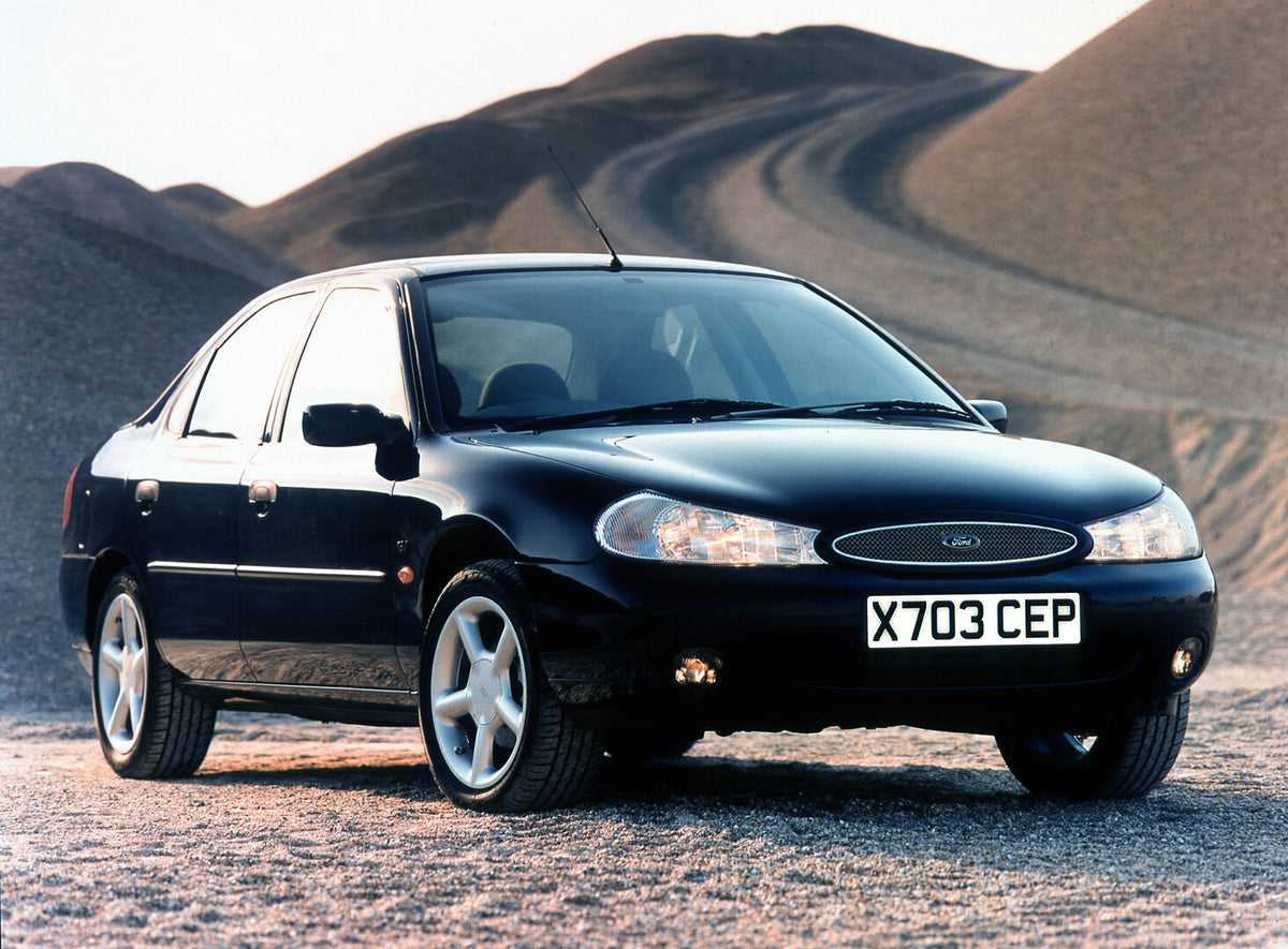 This archival image documents the 2000 Ford Mondeo in sandy hills 2000-355-34 and is preserved in the Ford Heritage Vault as part of Ford Motor Company's historic photographic archive. Free for personal, non-commercial use. Ford Heritage Vault ref...