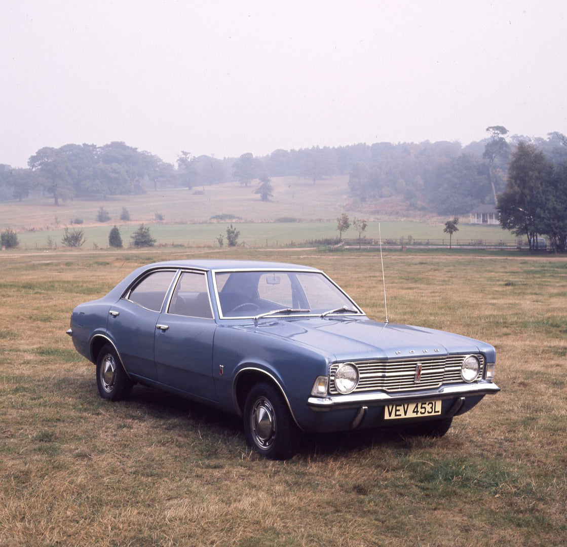 This archival image documents the 1972 Ford Cortina MK III 1600XL 4 door in scenic field and is preserved in the Ford Heritage Vault as part of Ford Motor Company's historic photographic archive. Free for personal, non-commercial use. Ford Heritag...