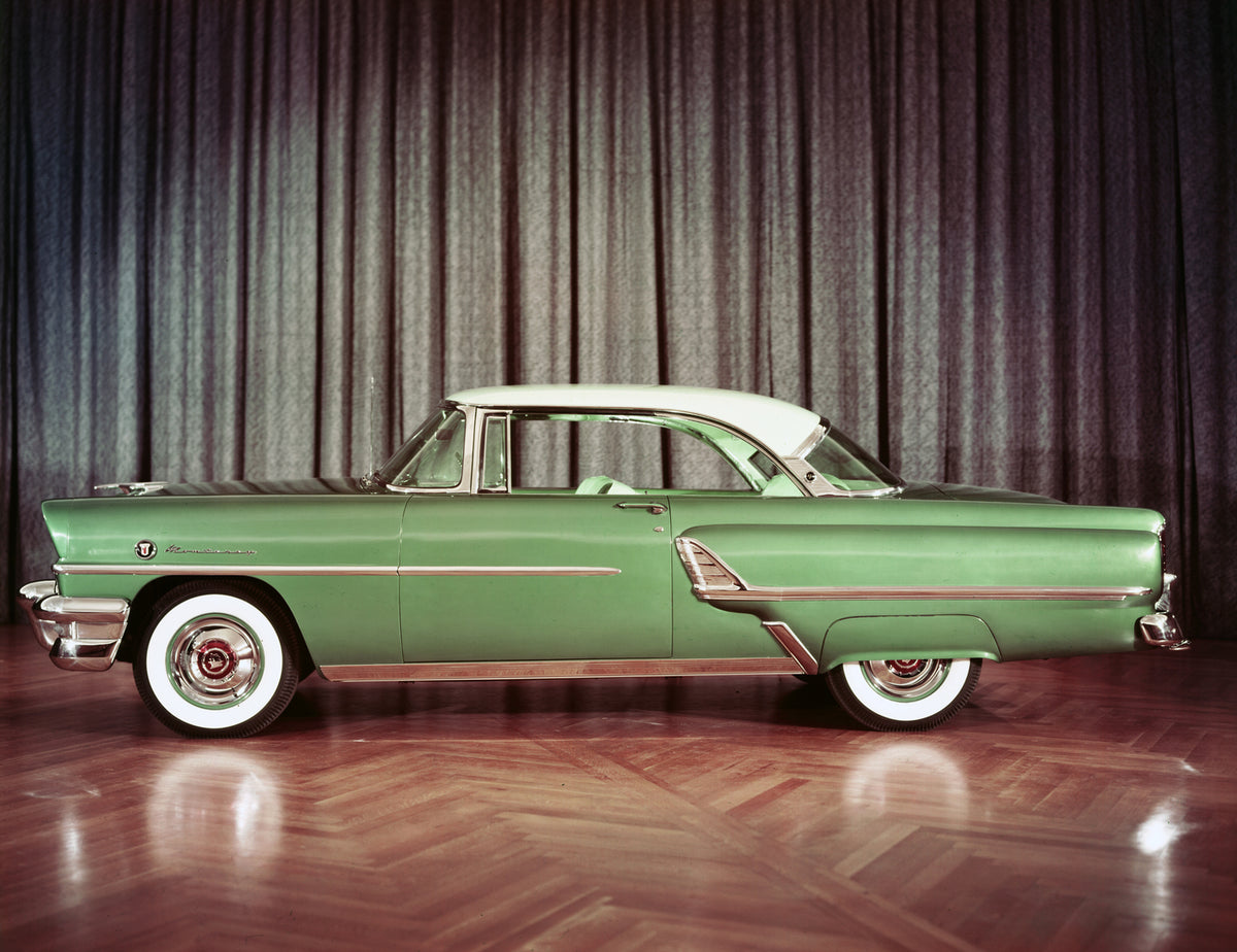 This archival image documents the 1955 Mercury Monterey hardtop Side View in Front of Curtain and is preserved in the Ford Heritage Vault as part of Ford Motor Company's historic photographic archive. Free for personal, non-commercial use. Ford He...