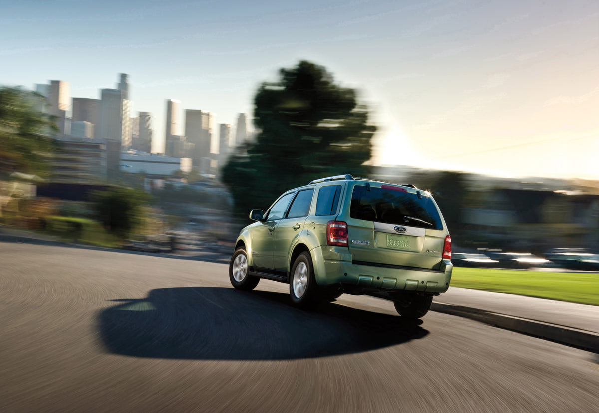 This archival image documents the 2010 Ford Escape action shot on scenic road MS1378 and is preserved in the Ford Heritage Vault as part of Ford Motor Company's historic photographic archive. Free for personal, non-commercial use. Ford Heritage Va...