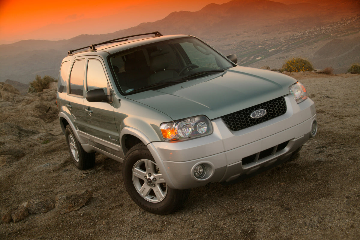 This archival image documents the 2005 Ford Escape Hybrid scenic and is preserved in the Ford Heritage Vault as part of Ford Motor Company's historic photographic archive. Free for personal, non-commercial use. Ford Heritage Vault reference AR-200...