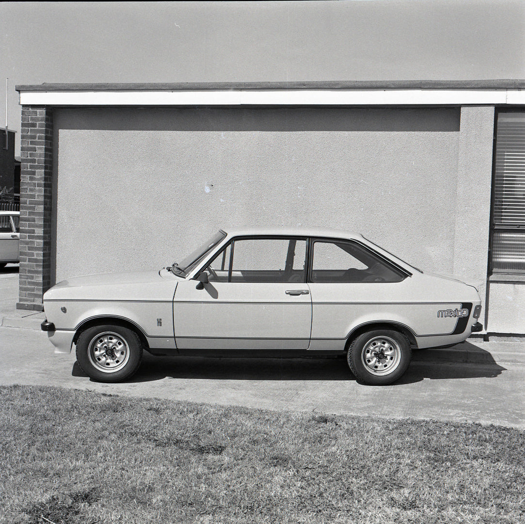 This archival image documents the 1975 Ford Escort Mexico MKII side view in front of building and is preserved in the Ford Heritage Vault as part of Ford Motor Company's historic photographic archive. Free for personal, non-commercial use. Ford He...