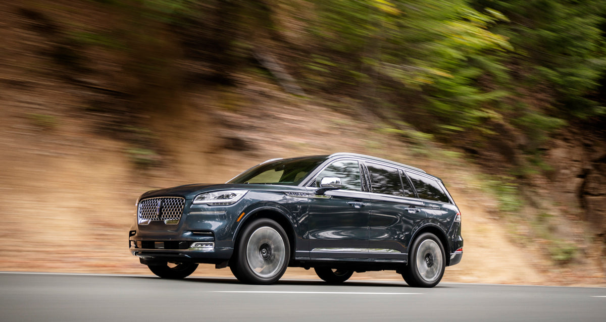 This archival image documents the 2020 Lincoln Aviator Grand Touring action shot on scenic road and is preserved in the Ford Heritage Vault as part of Ford Motor Company's historic photographic archive. Free for personal, non-commercial use. Ford ...