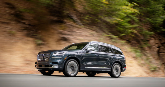 2020 Lincoln Aviator Grand Touring action shot on scenic road HV 2020-0020
