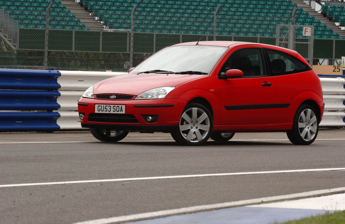 This archival image documents the 2003 Ford Focus Mark I in stadium and is preserved in the Ford Heritage Vault as part of Ford Motor Company's historic photographic archive. Free for personal, non-commercial use. Ford Heritage Vault reference AR-...