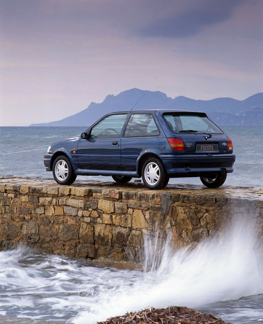 This archival image documents the 1994 1/2 Ford Fiesta Mark III rear view near ocean in Cannes vertical shot and is preserved in the Ford Heritage Vault as part of Ford Motor Company's historic photographic archive. Free for personal, non-commerci...