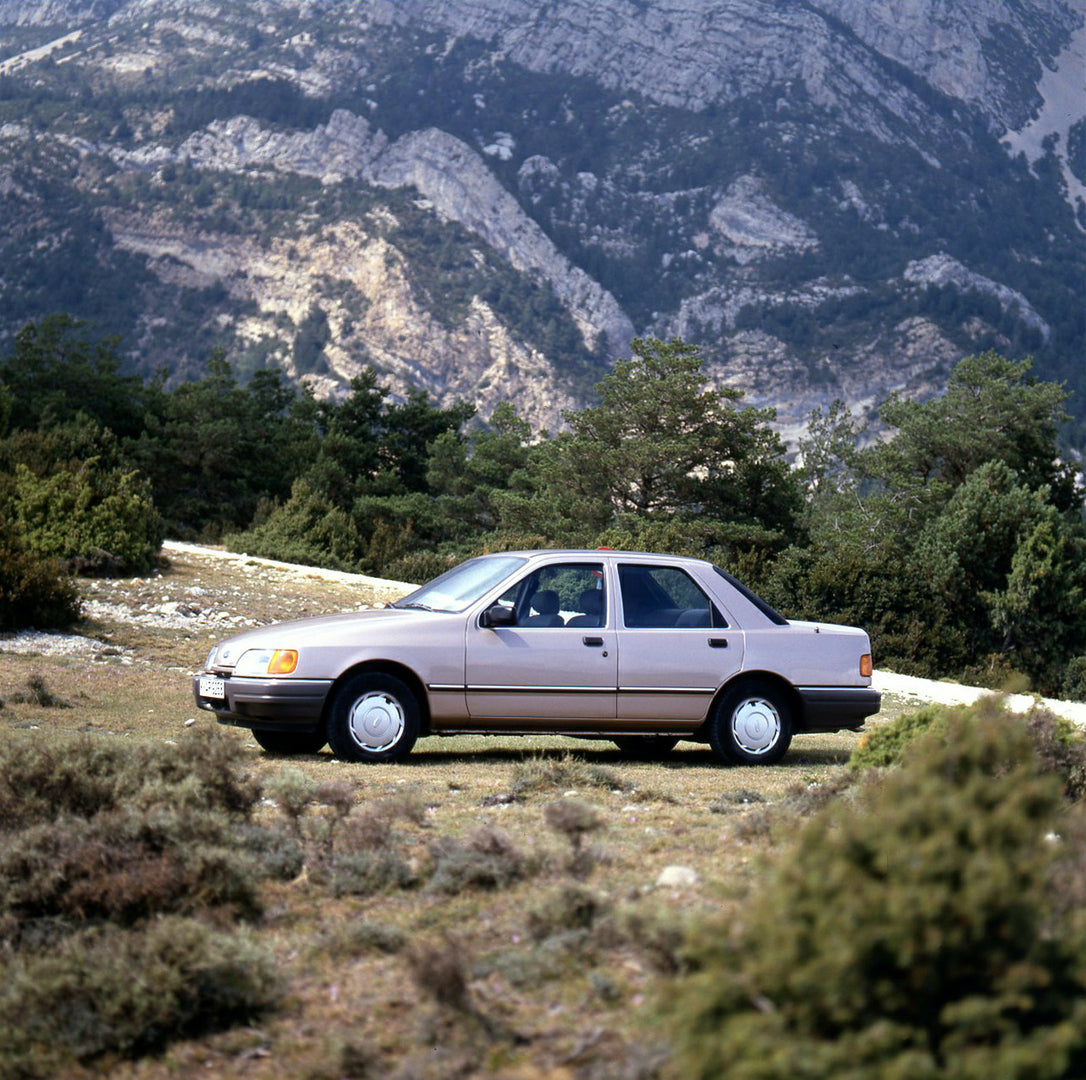 This archival image documents the 1986 Heritage Archive - 1987 1/2 Ford Sierra side view with scenic trees in Spain and is preserved in the Ford Heritage Vault as part of Ford Motor Company's historic photographic archive. Free for personal, non-c...