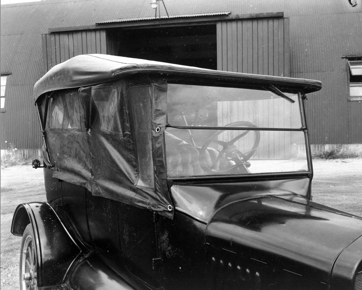 This archival image documents the 1922 Ford Model T side curtains and is preserved in the Ford Heritage Vault as part of Ford Motor Company's historic photographic archive. Free for personal, non-commercial use. Ford Heritage Vault reference AR-20...