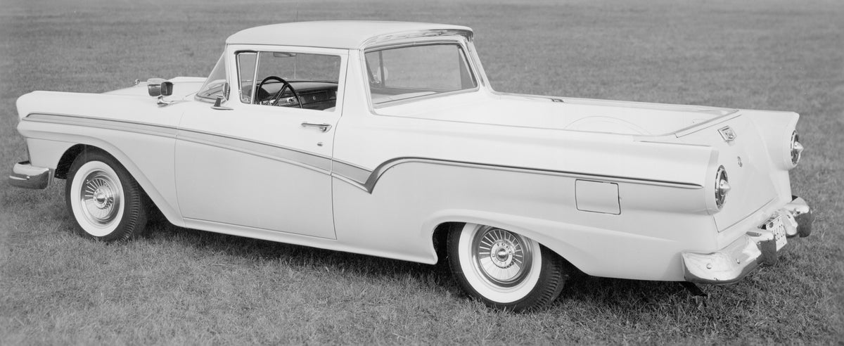 This archival image documents the 1957 Ford Ranchero rear view in scenic field and is preserved in the Ford Heritage Vault as part of Ford Motor Company's historic photographic archive. Free for personal, non-commercial use. Ford Heritage Vault re...