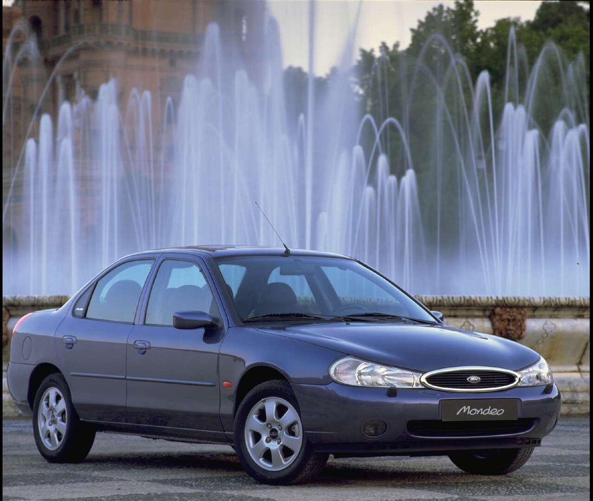 This archival image documents the 2002 Ford Mondeo Mark II Ghia Saloon 4 Door with scenic fountain and is preserved in the Ford Heritage Vault as part of Ford Motor Company's historic photographic archive. Free for personal, non-commercial use. Fo...