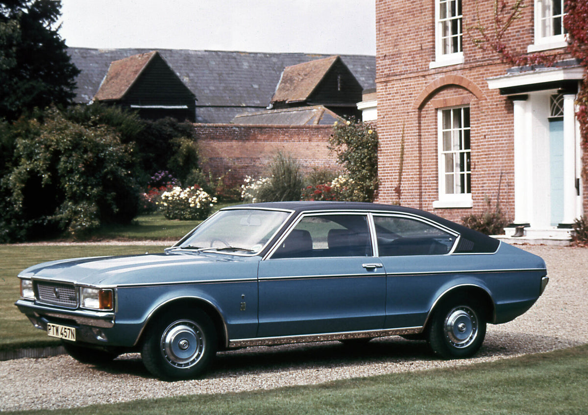 This archival image documents the 1974 Ford Granada MKI coupe side view in front of house 1974-911-1 and is preserved in the Ford Heritage Vault as part of Ford Motor Company's historic photographic archive. Free for personal, non-commercial use. ...