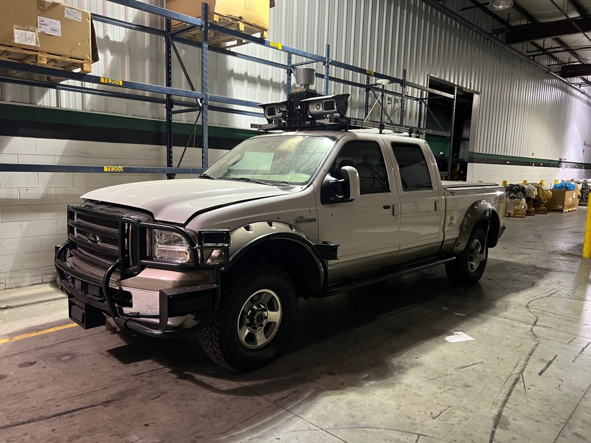 This archival image documents the 2005 Ford F-250 4x4 Crew Cab DARPA Super Duty and is preserved in the Ford Heritage Vault as part of Ford Motor Company's historic photographic archive. Free for personal, non-commercial use. Ford Heritage Vault r...