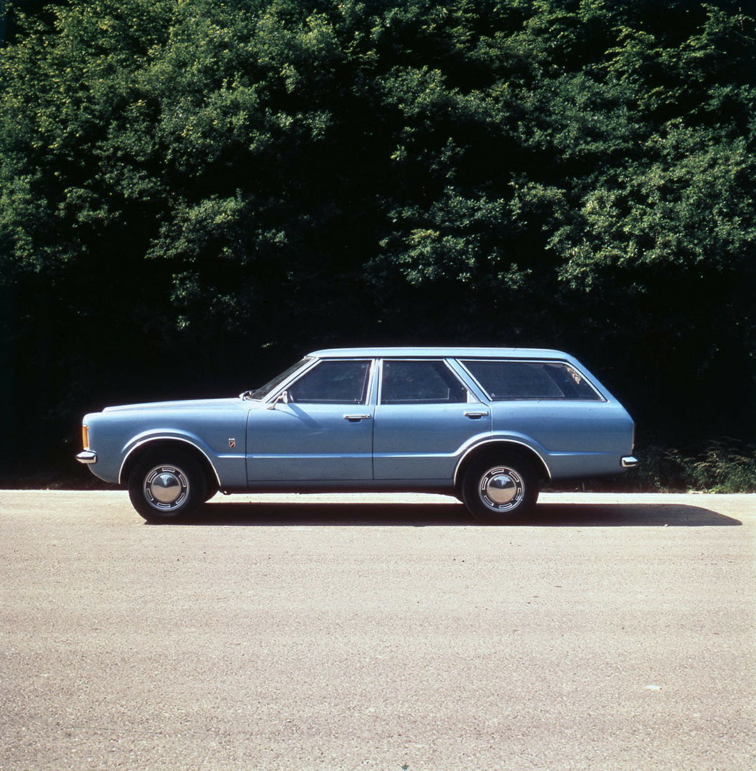 This archival image documents the 1974 Ford Taunus side view with scenic trees and is preserved in the Ford Heritage Vault as part of Ford Motor Company's historic photographic archive. Free for personal, non-commercial use. Ford Heritage Vault re...