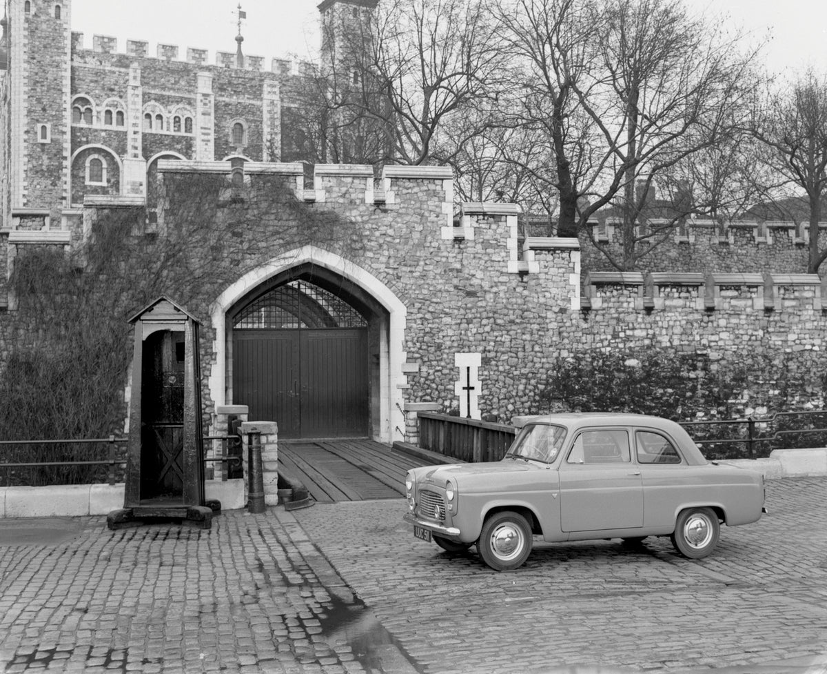 This archival image documents the 1958 Ford Anglia in front of Tower of London and is preserved in the Ford Heritage Vault as part of Ford Motor Company's historic photographic archive. Free for personal, non-commercial use. Ford Heritage Vault re...