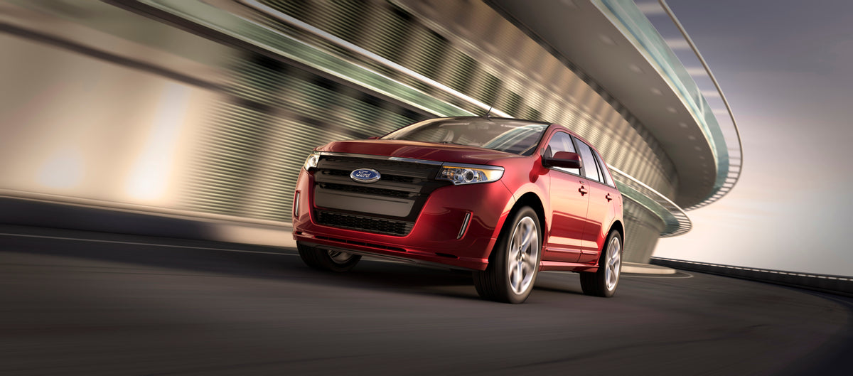 This archival image documents the 2013 Ford Edge action shot on road MS0244860 and is preserved in the Ford Heritage Vault as part of Ford Motor Company's historic photographic archive. Free for personal, non-commercial use. Ford Heritage Vault re...