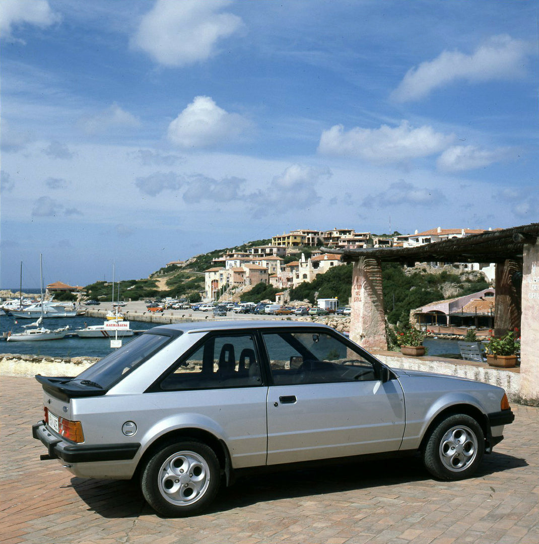 This archival image documents the 1980 Ford Escort Mark III LHD press introduction in Sardinia and is preserved in the Ford Heritage Vault as part of Ford Motor Company's historic photographic archive. Free for personal, non-commercial use. Ford H...