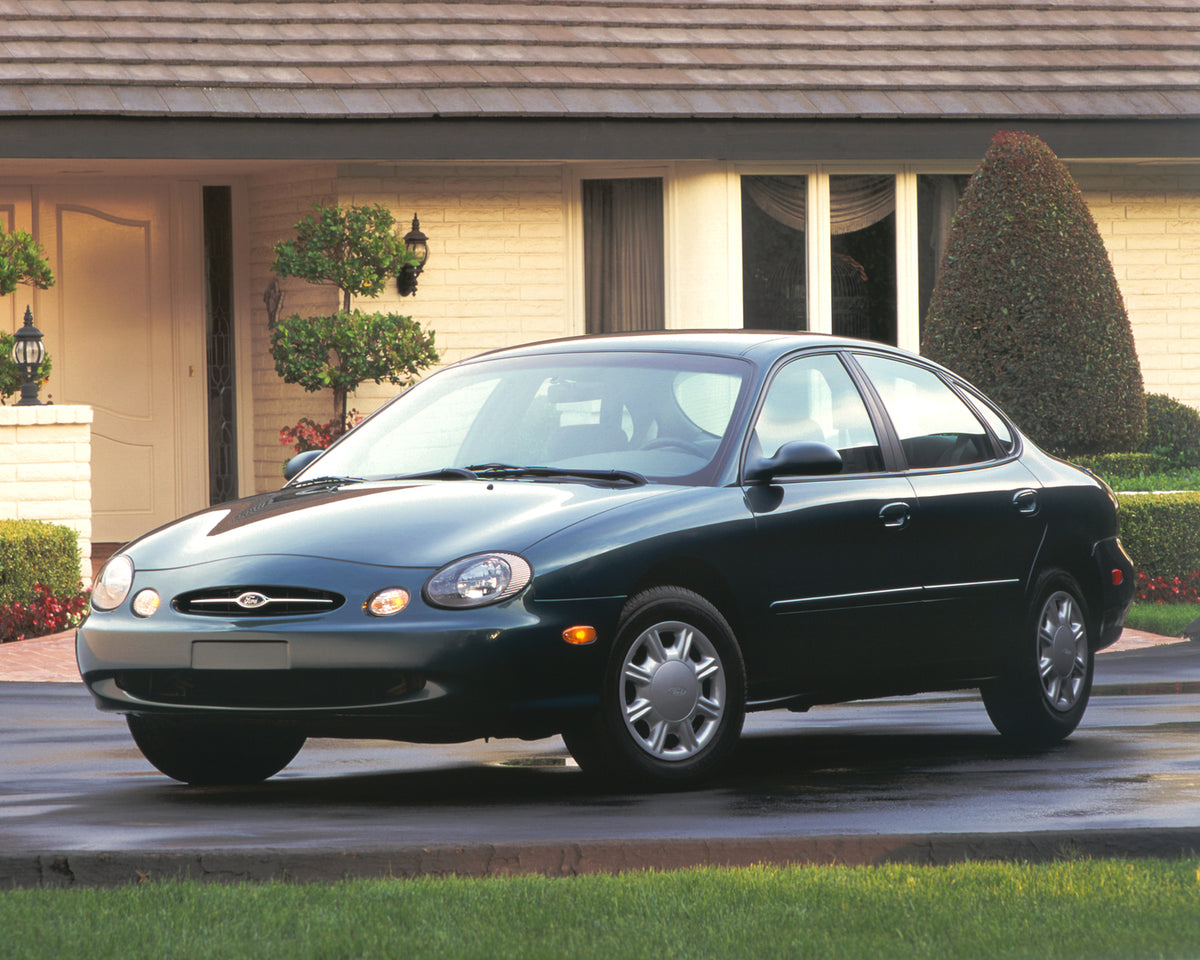 This archival image documents the 1998 Ford Taurus LX and is preserved in the Ford Heritage Vault as part of Ford Motor Company's historic photographic archive. Free for personal, non-commercial use. Ford Heritage Vault reference AR-2008-8.1.2.7462.