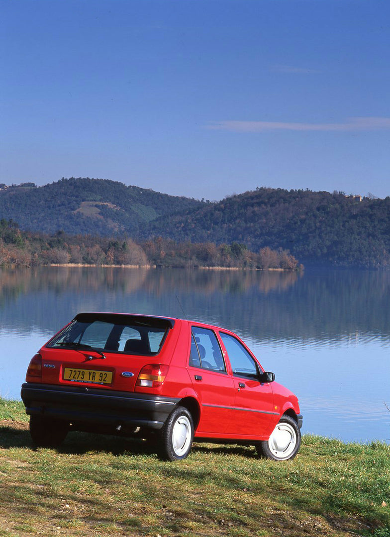 This archival image documents the 1994 Ford Fiesta Mark III near water and mountains in Nice, France and is preserved in the Ford Heritage Vault as part of Ford Motor Company's historic photographic archive. Free for personal, non-commercial use. ...