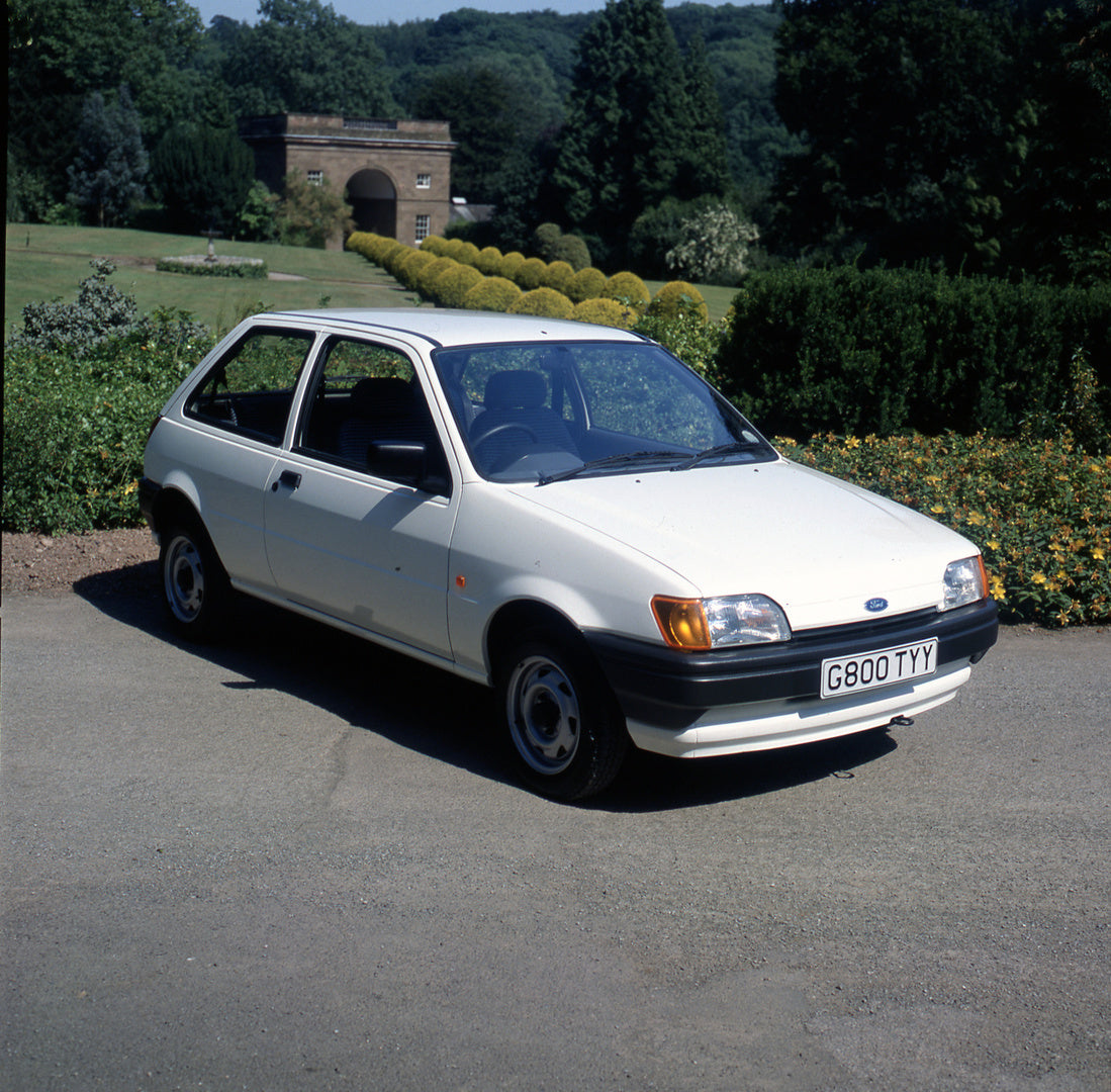 This archival image documents the 1989 Ford Fiesta Mark III Popular with scenic plants and archway and is preserved in the Ford Heritage Vault as part of Ford Motor Company's historic photographic archive. Free for personal, non-commercial use. Fo...