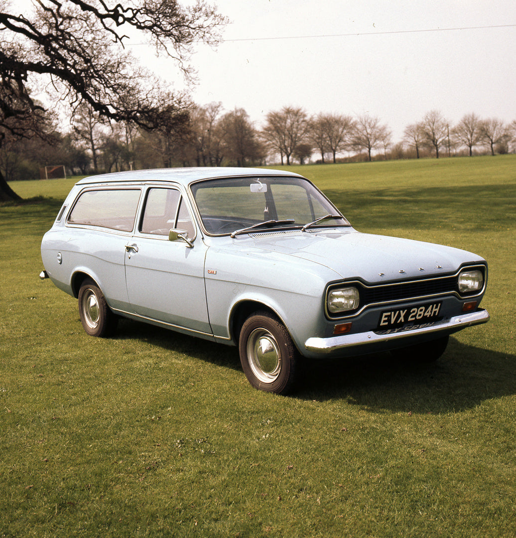 This archival image documents the 1970 Ford Escort Mark I Estate GT in scenic field and is preserved in the Ford Heritage Vault as part of Ford Motor Company's historic photographic archive. Free for personal, non-commercial use. Ford Heritage Vau...