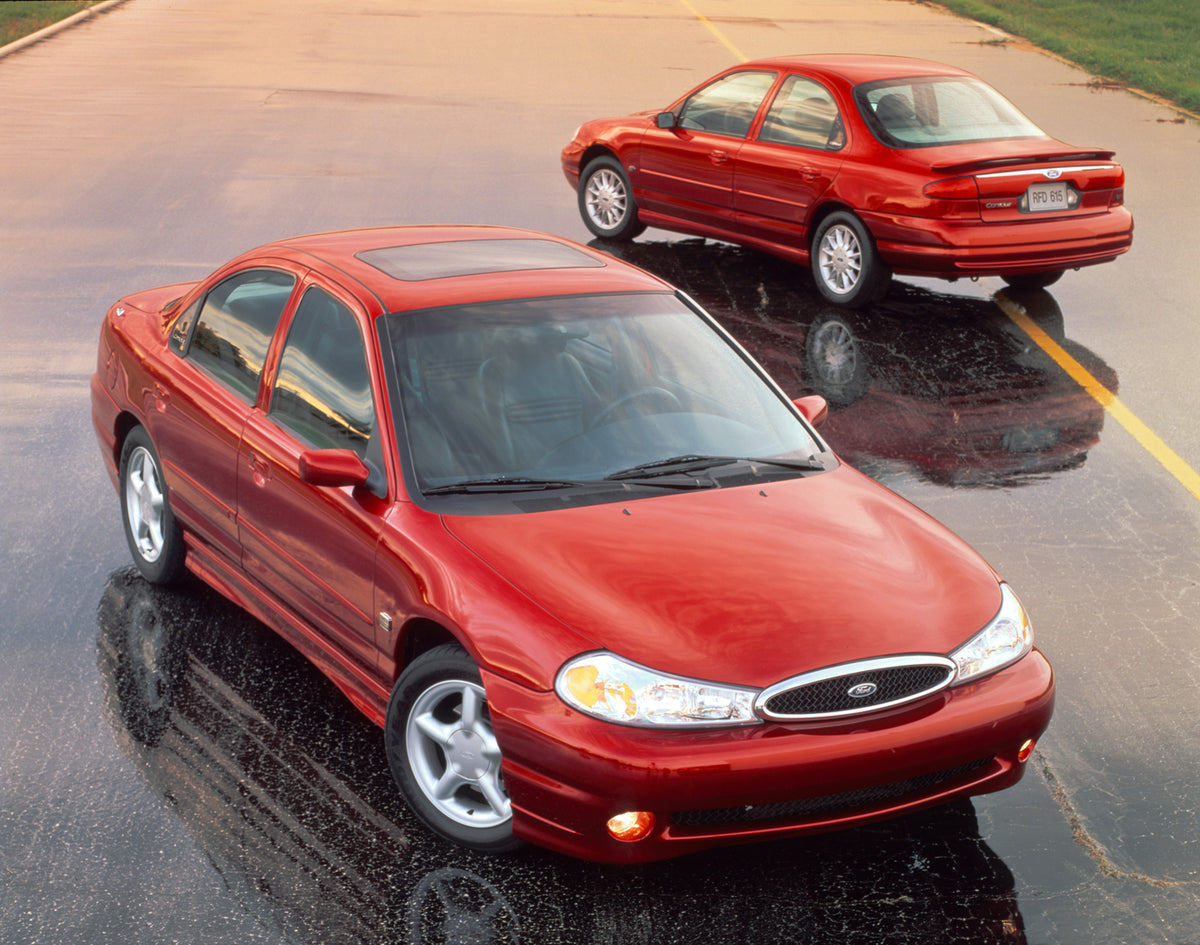 This archival image documents the 1998 Ford Contour SE and SVT and is preserved in the Ford Heritage Vault as part of Ford Motor Company's historic photographic archive. Free for personal, non-commercial use. Ford Heritage Vault reference AR-2008-...