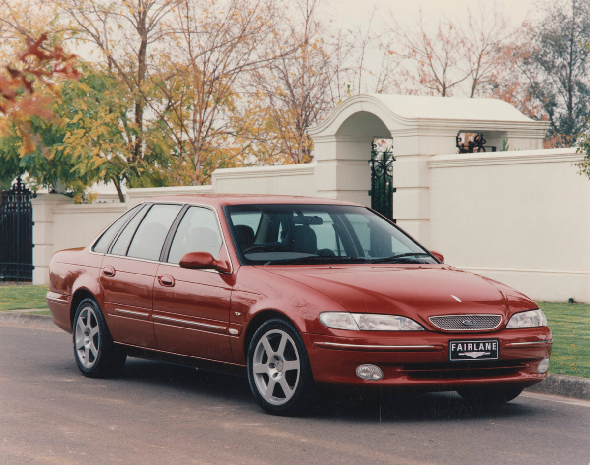 This archival image documents the 1998 Ford NL Fairlane Sedan Driver Side Front End View on Neighborhood Street FAP-2011-3 and is preserved in the Ford Heritage Vault as part of Ford Motor Company's historic photographic archive. Free for personal...