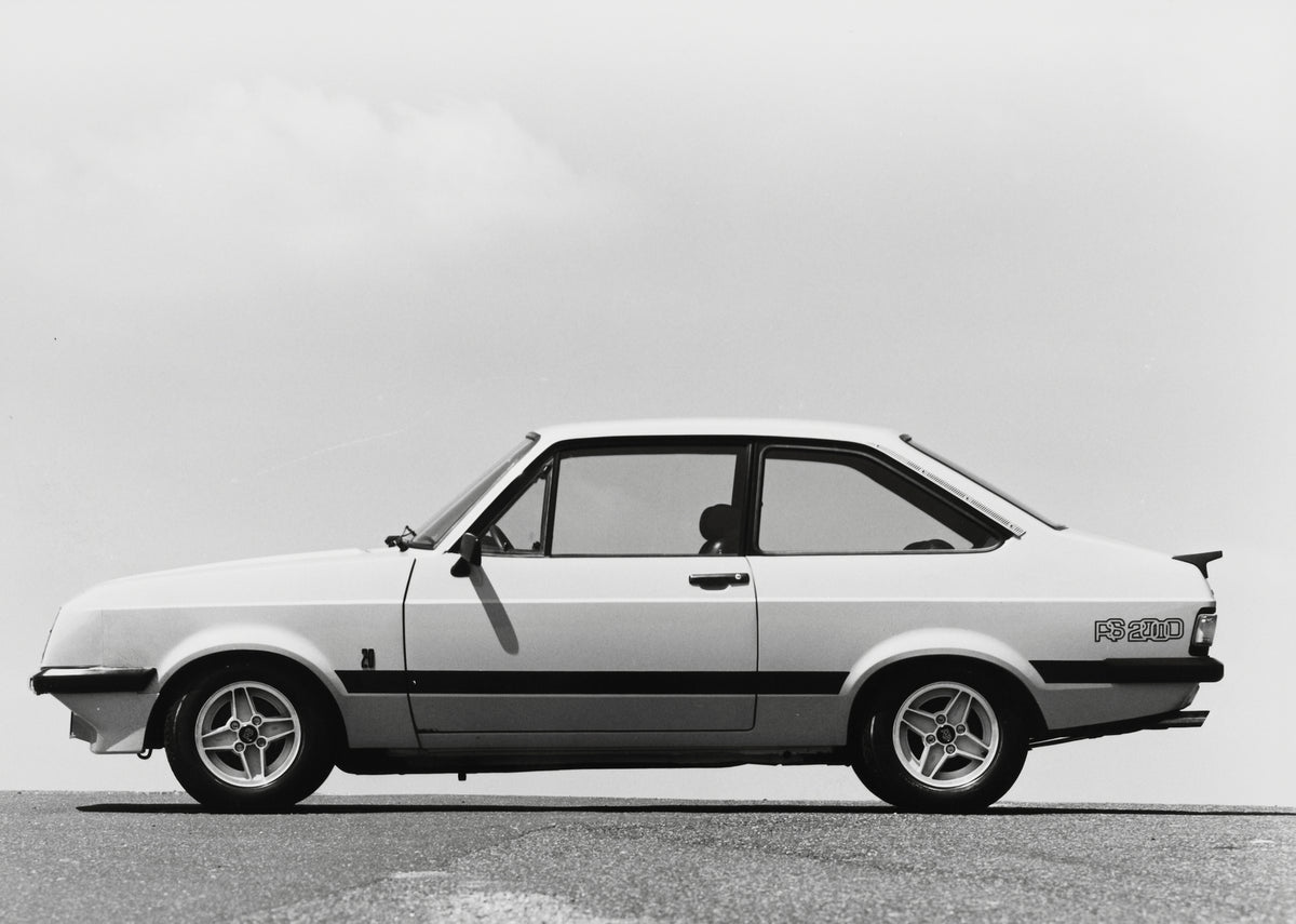 This archival image documents the 1975 Ford Escort Mark II RS2000 side view on pavement and is preserved in the Ford Heritage Vault as part of Ford Motor Company's historic photographic archive. Free for personal, non-commercial use. Ford Heritage...