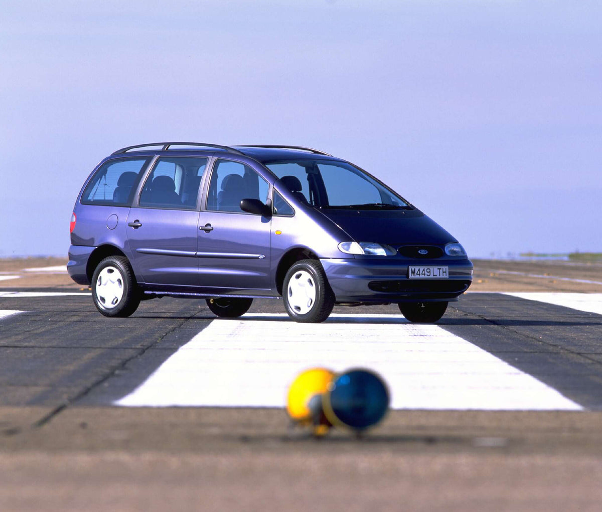 This archival image documents the 1994 Ford Galaxy Mark I GLX on tarmac AR-2002-213709 and is preserved in the Ford Heritage Vault as part of Ford Motor Company's historic photographic archive. Free for personal, non-commercial use. Ford Heritage ...