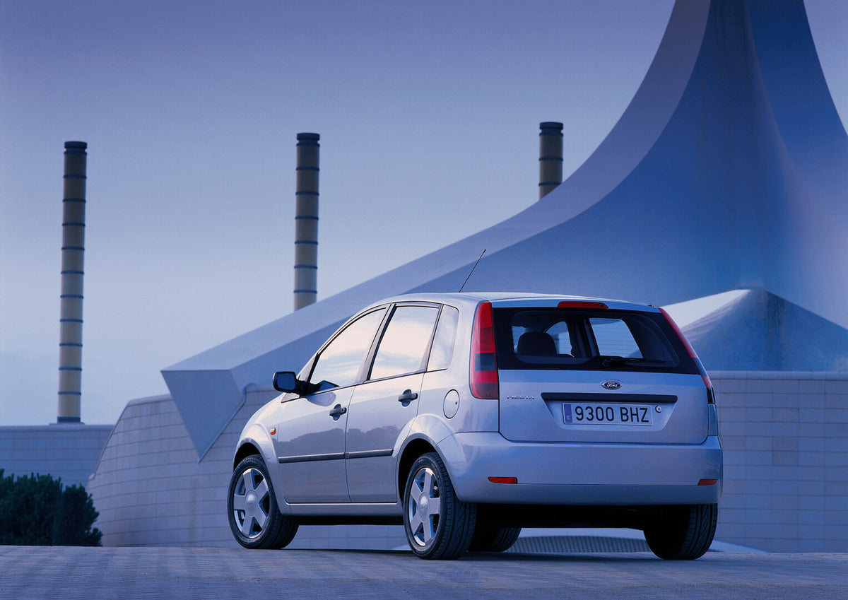 This archival image documents the 2001 Ford Fiesta Mark V rear view with scenic building and is preserved in the Ford Heritage Vault as part of Ford Motor Company's historic photographic archive. Free for personal, non-commercial use. Ford Heritag...