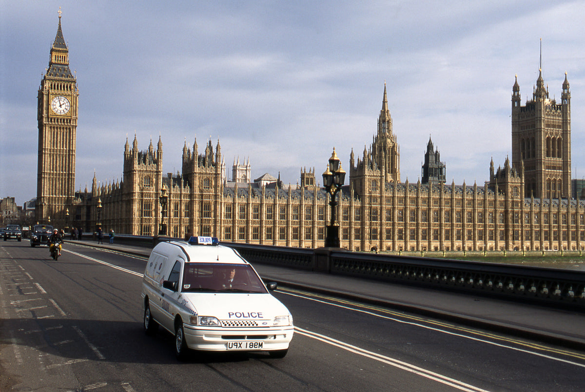 This archival image documents the 1995 Ford Escort Mark V Electric Police Van in front of Palace of Westminster and is preserved in the Ford Heritage Vault as part of Ford Motor Company's historic photographic archive. Free for personal, non-comme...