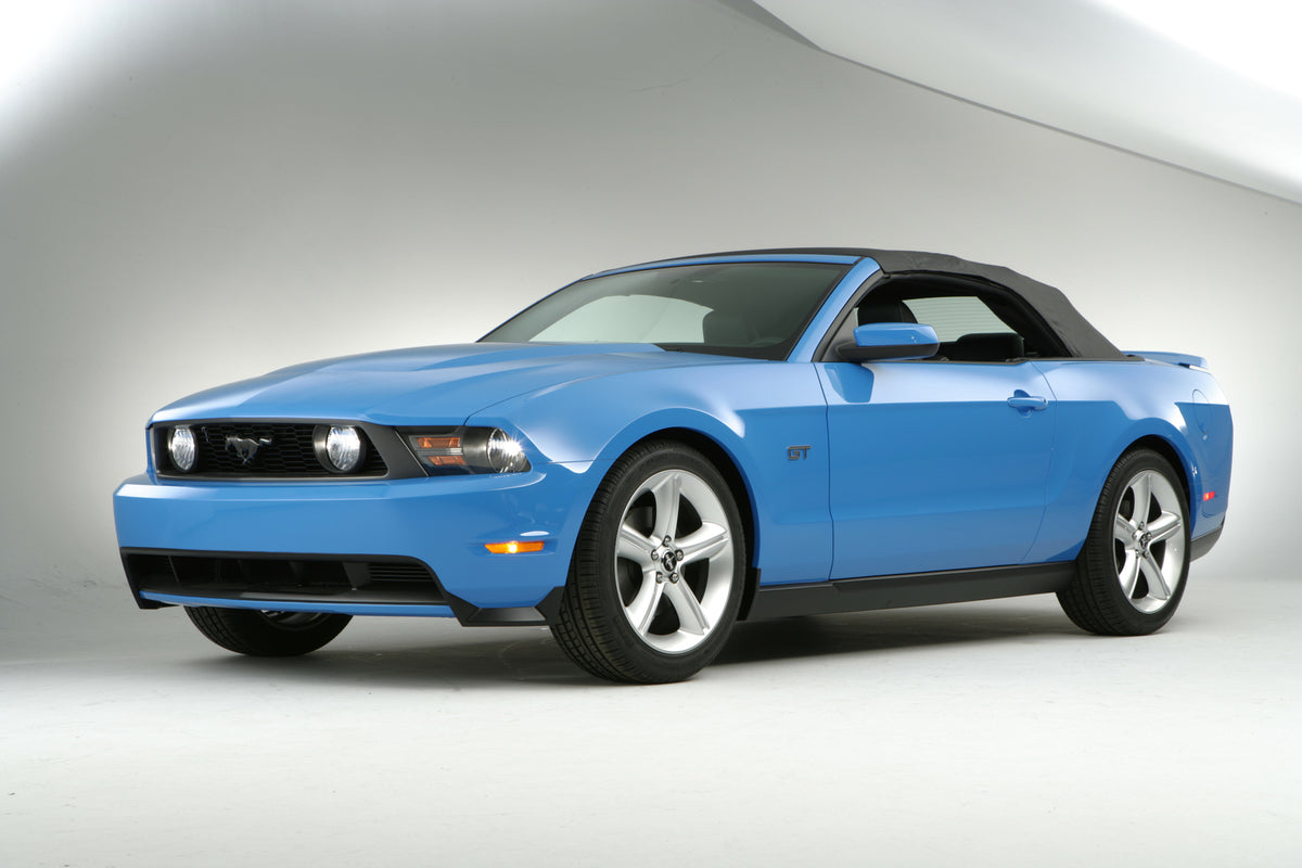 This archival image documents the 2009 Ford Mustang convertible and is preserved in the Ford Heritage Vault as part of Ford Motor Company's historic photographic archive. Free for personal, non-commercial use. Ford Heritage Vault reference AR-2008...
