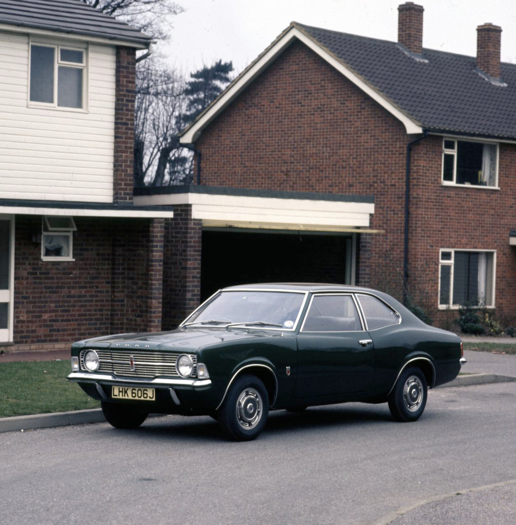 This archival image documents the 1971 Ford Cortina MK III XL 1600 on street with brick house and is preserved in the Ford Heritage Vault as part of Ford Motor Company's historic photographic archive. Free for personal, non-commercial use. Ford He...