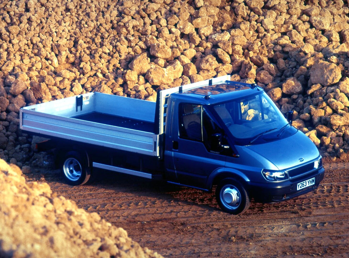 This archival image documents the 2001 Ford Transit Mark IV in rocky area and is preserved in the Ford Heritage Vault as part of Ford Motor Company's historic photographic archive. Free for personal, non-commercial use. Ford Heritage Vault referen...