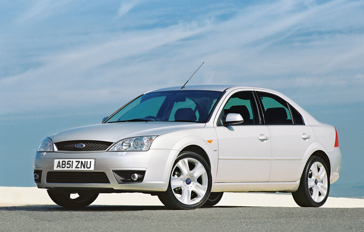 This archival image documents the 2001 Ford Mondeo Mark II Zetec-S with scenic blue sky and is preserved in the Ford Heritage Vault as part of Ford Motor Company's historic photographic archive. Free for personal, non-commercial use. Ford Heritage...