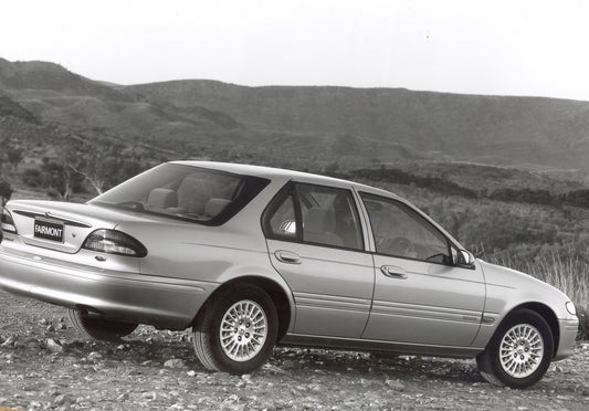 1994 Ford Falcon EF Fairmont rear view with scenic mountains HV 1994-0080