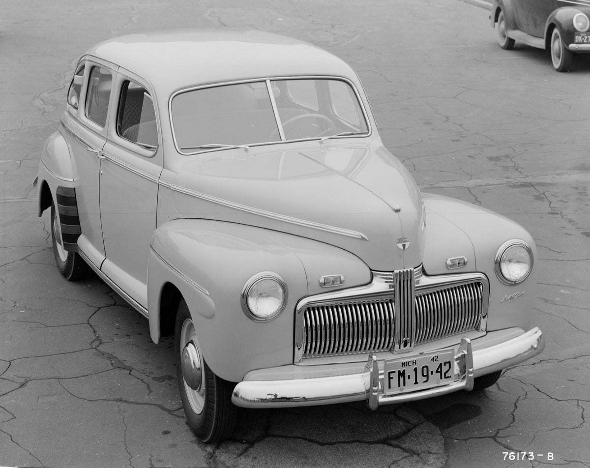 This archival image documents the 1942 Ford Super Deluxe fordor sedan and is preserved in the Ford Heritage Vault as part of Ford Motor Company's historic photographic archive. Free for personal, non-commercial use. Ford Heritage Vault reference A...