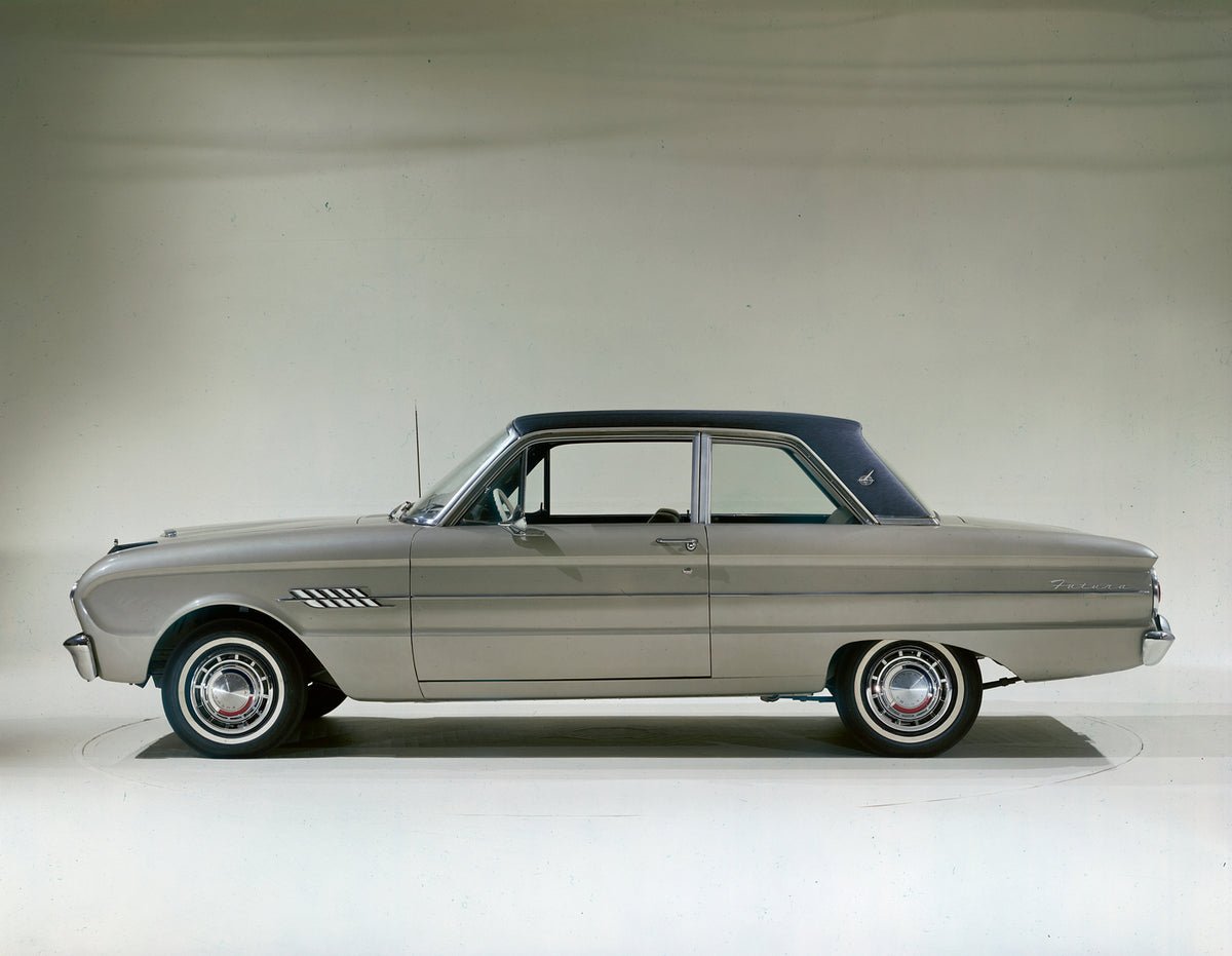 This archival image documents the 1962 Ford Falcon Futura two-door sedan and is preserved in the Ford Heritage Vault as part of Ford Motor Company's historic photographic archive. Free for personal, non-commercial use. Ford Heritage Vault referenc...