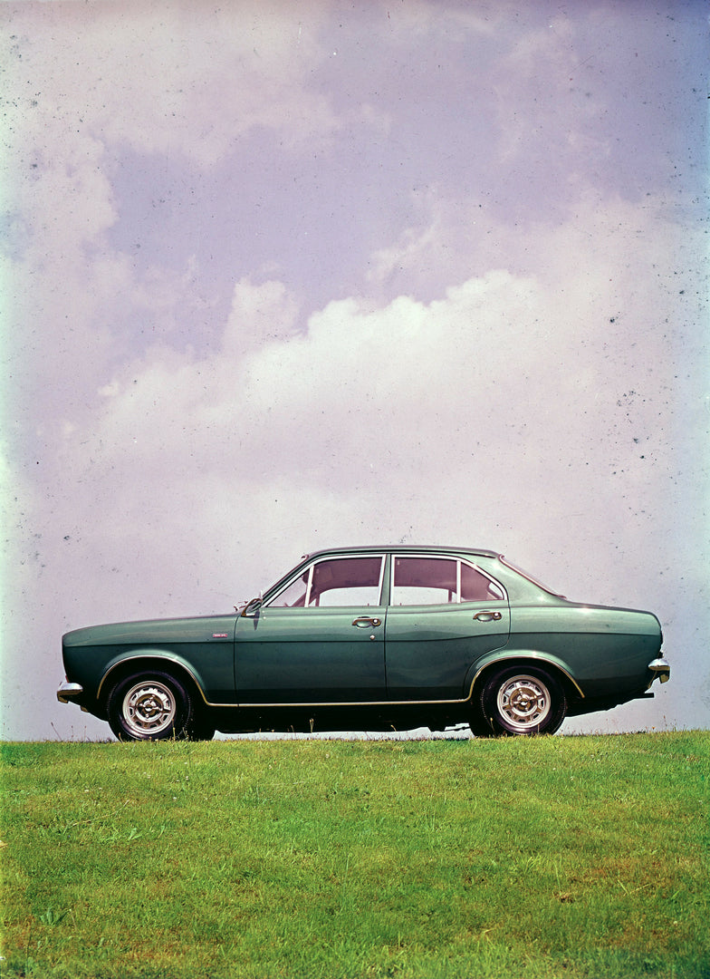 This archival image documents the 1970 Ford Escort Mark I 1300 XL Sport side view on scenic hill and is preserved in the Ford Heritage Vault as part of Ford Motor Company's historic photographic archive. Free for personal, non-commercial use. Ford...