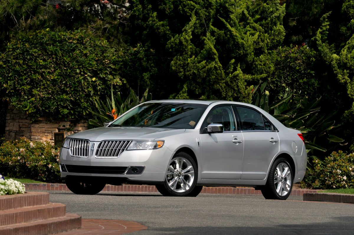 This archival image documents the 2010 Lincoln MKZ with scenic trees MS8697 and is preserved in the Ford Heritage Vault as part of Ford Motor Company's historic photographic archive. Free for personal, non-commercial use. Ford Heritage Vault refer...