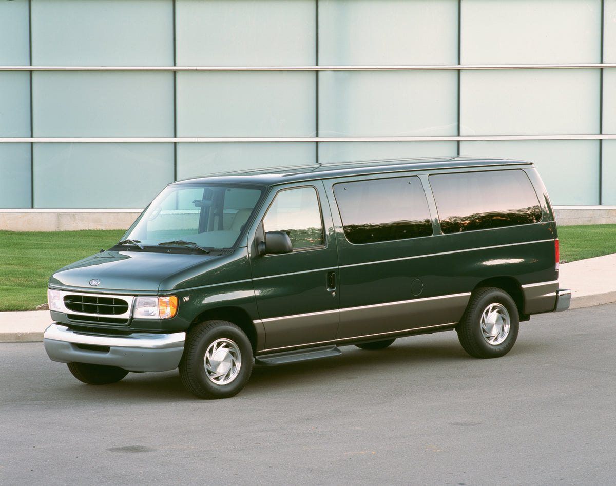 This archival image documents the 2002 Ford Econoline Traveler and is preserved in the Ford Heritage Vault as part of Ford Motor Company's historic photographic archive. Free for personal, non-commercial use. Ford Heritage Vault reference AR-2008-...