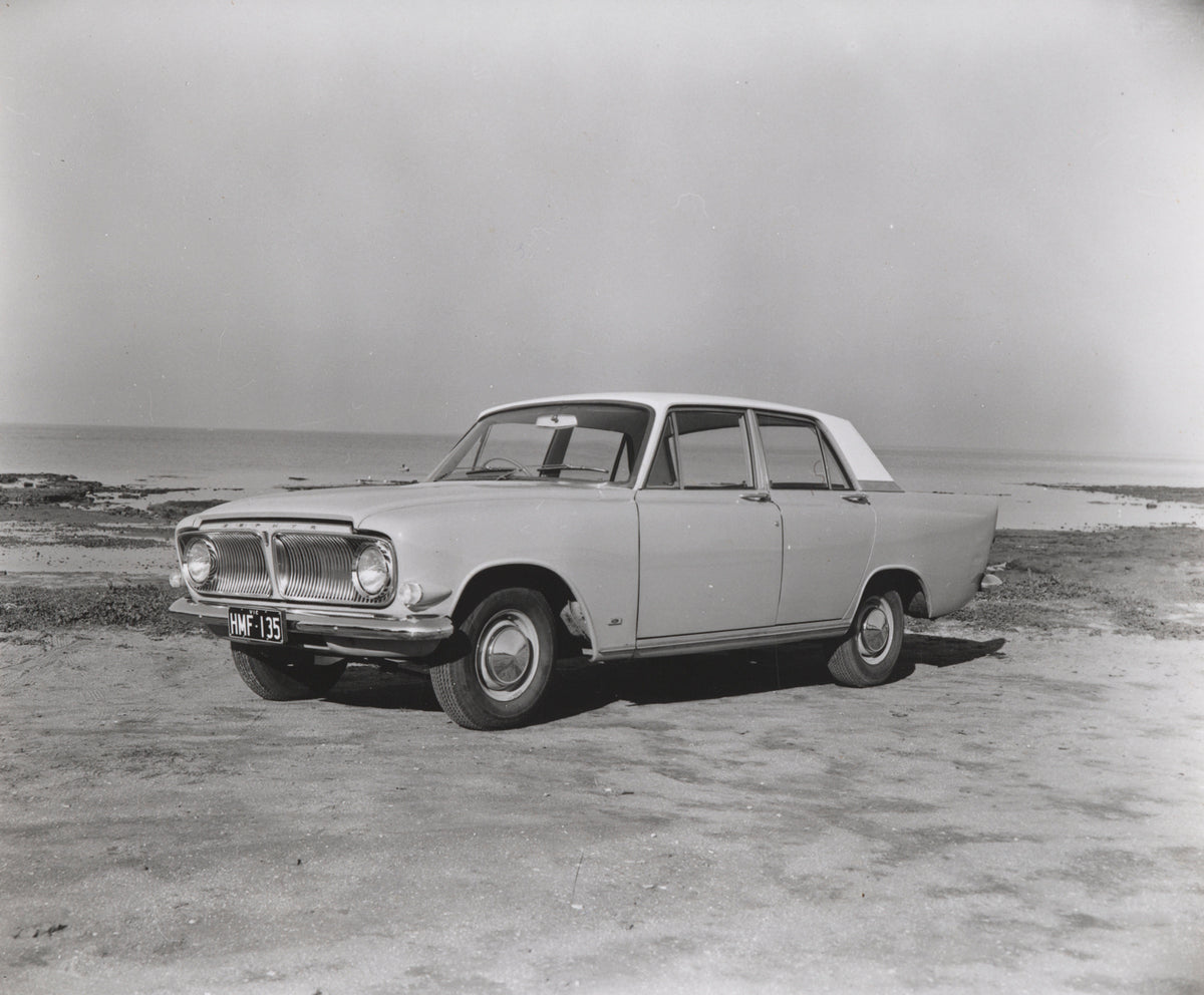 This archival image documents the 1962 Ford Zephyr Mark III Sedan Passenger Side Front End View at the Beach FAP-2011-3 and is preserved in the Ford Heritage Vault as part of Ford Motor Company's historic photographic archive. Free for personal, n...