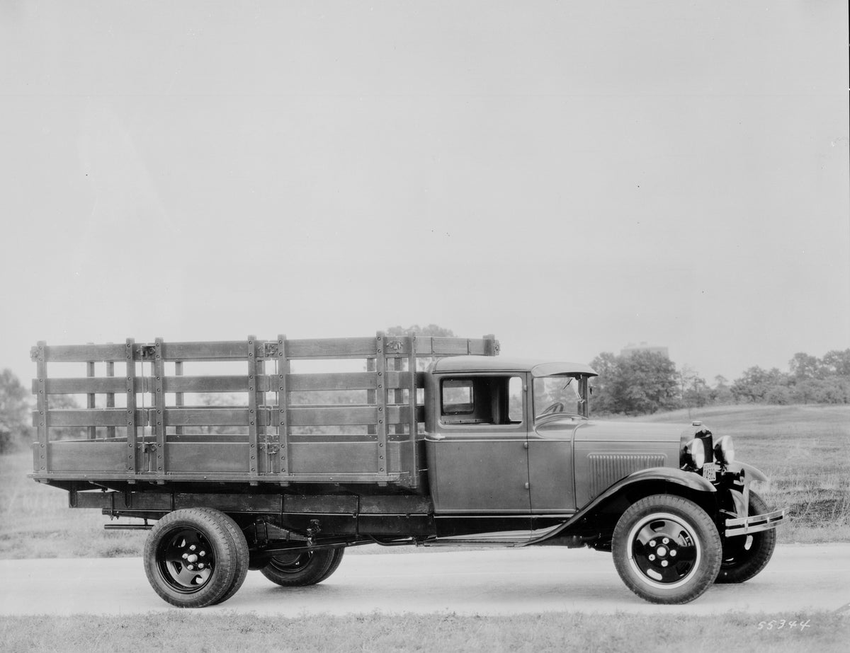 This archival image documents the 1930 Ford Model AA stake truck and is preserved in the Ford Heritage Vault as part of Ford Motor Company's historic photographic archive. Free for personal, non-commercial use. Ford Heritage Vault reference AR-200...
