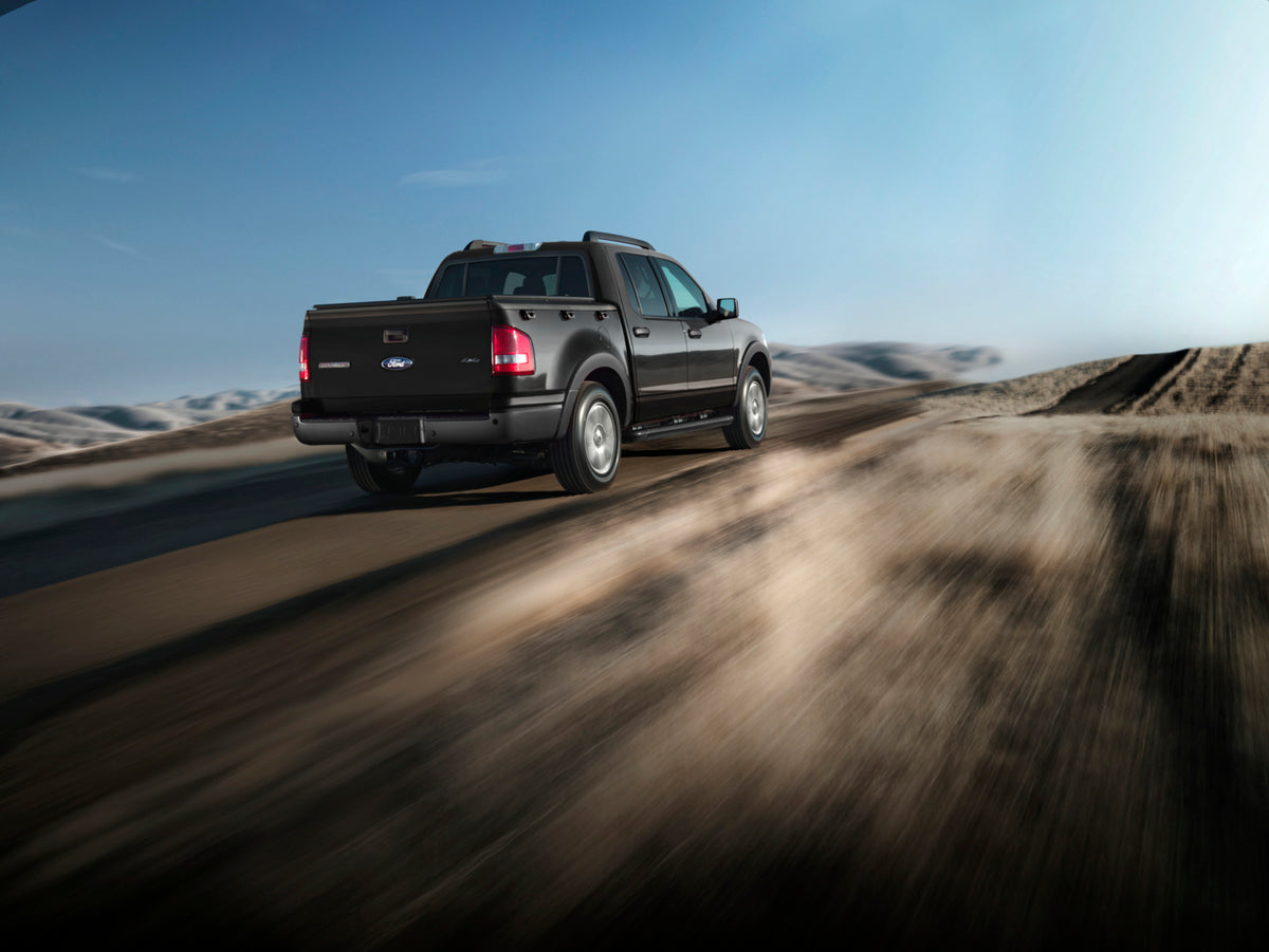 This archival image documents the 2010 Ford Explorer Sport Trac action shot on dirt road MS4490 and is preserved in the Ford Heritage Vault as part of Ford Motor Company's historic photographic archive. Free for personal, non-commercial use. Ford ...