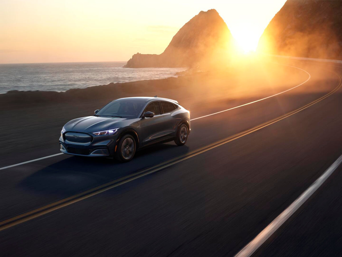 This archival image documents the 2021 Ford Mach-E action shot on scenic road MS48111 and is preserved in the Ford Heritage Vault as part of Ford Motor Company's historic photographic archive. Free for personal, non-commercial use. Ford Heritage V...