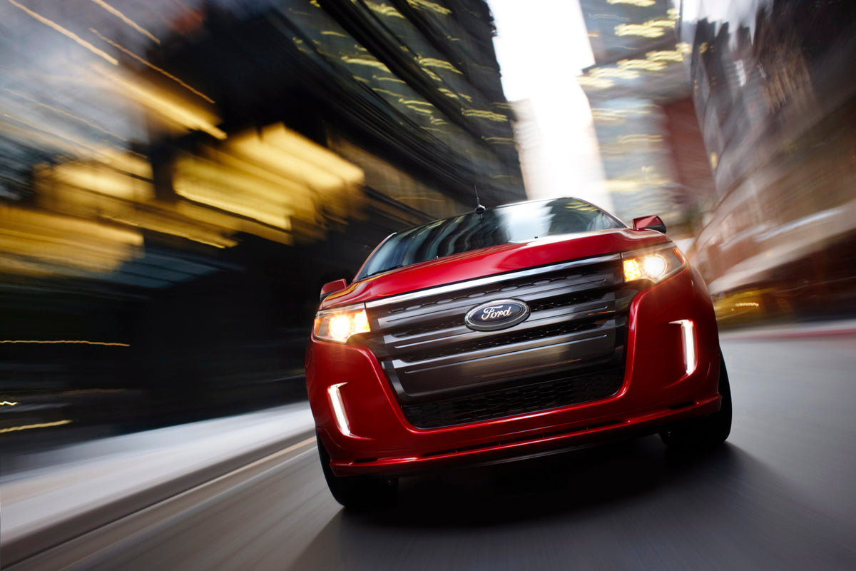 This archival image documents the 2013 Ford Edge action shot on city street MS4030 and is preserved in the Ford Heritage Vault as part of Ford Motor Company's historic photographic archive. Free for personal, non-commercial use. Ford Heritage Vaul...