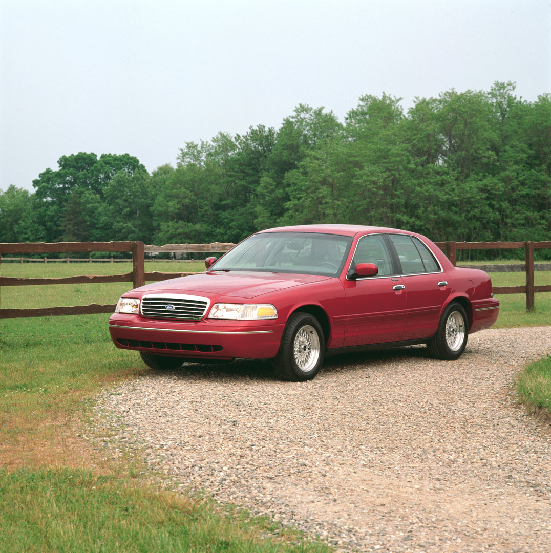 This archival image documents the 1998 Ford Crown Victoria LX and is preserved in the Ford Heritage Vault as part of Ford Motor Company's historic photographic archive. Free for personal, non-commercial use. Ford Heritage Vault reference AR-2008-8...