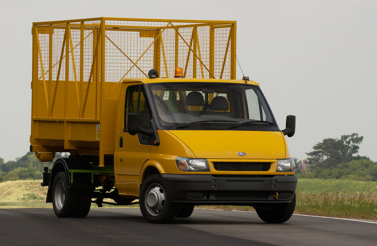 This archival image documents the 2003 Ford Transit Mark IV conversion with wire container on scenic road and is preserved in the Ford Heritage Vault as part of Ford Motor Company's historic photographic archive. Free for personal, non-commercial ...